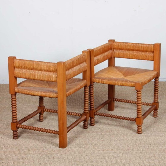 Image 1 of Paar gedraaide houten hoekstoelen met rieten zitting, 1940