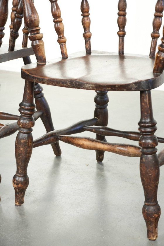 Image 1 of 4 x Antique wooden English pub/captain chairs from the late 19th century with character