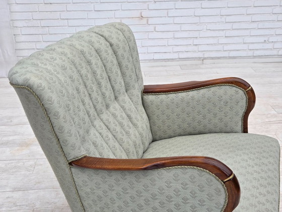Image 1 of Deense fauteuil uit de jaren 60, lichtblauwe meubelstof, beukenhout.