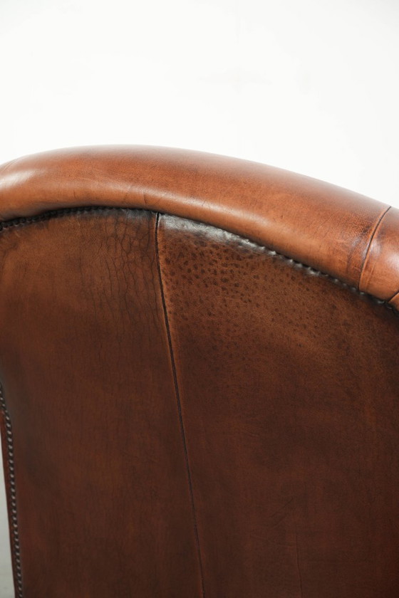 Vintage schapenleren armchair met een comfortabele zit en afgewerkt met siernagels – Fauteuils, Leather (photo 14 of 14)