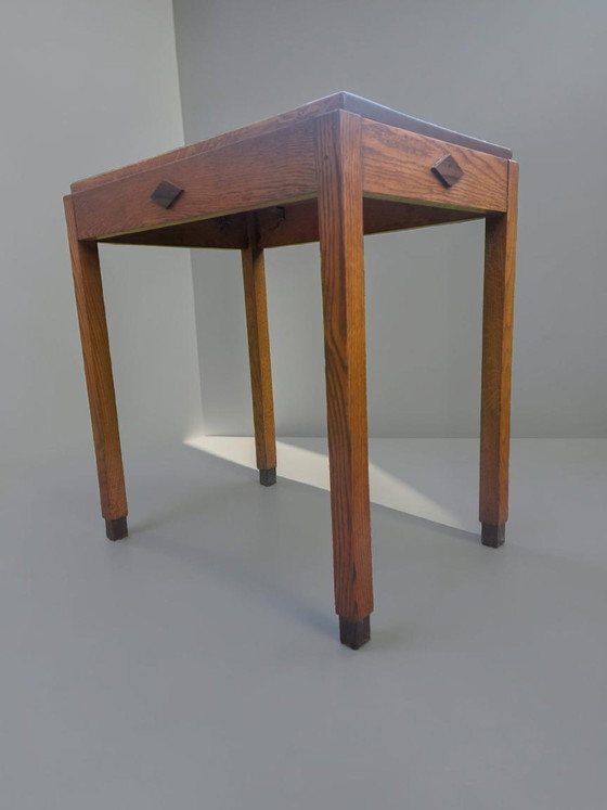 Image 1 of petite table, table de l'école d'Amsterdam