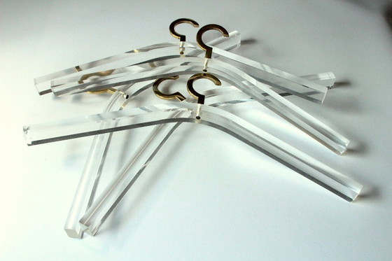 Image 1 of 5 Postmodern acrylic coat hangers with brass hangers
