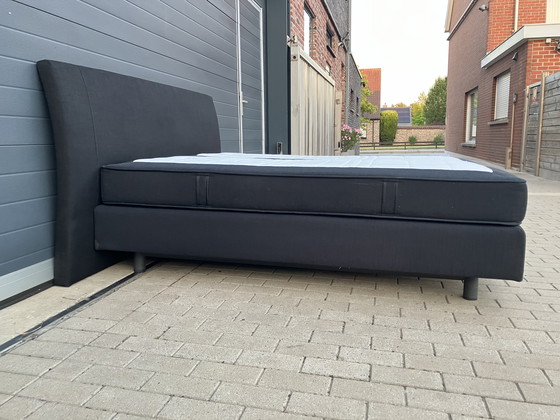 Image 1 of Auping Boxspring 160x200 nero con materassi Auping Cresto in ottime condizioni!