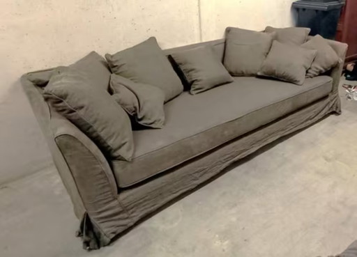 High-quality green-gray sofa in denim fabric in very neat condition