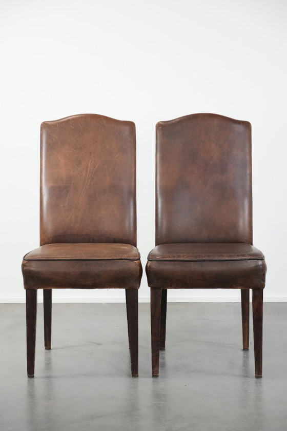 Image 1 of 8 x Tijdloze vintage schapenleren eetkamerstoel met karakter