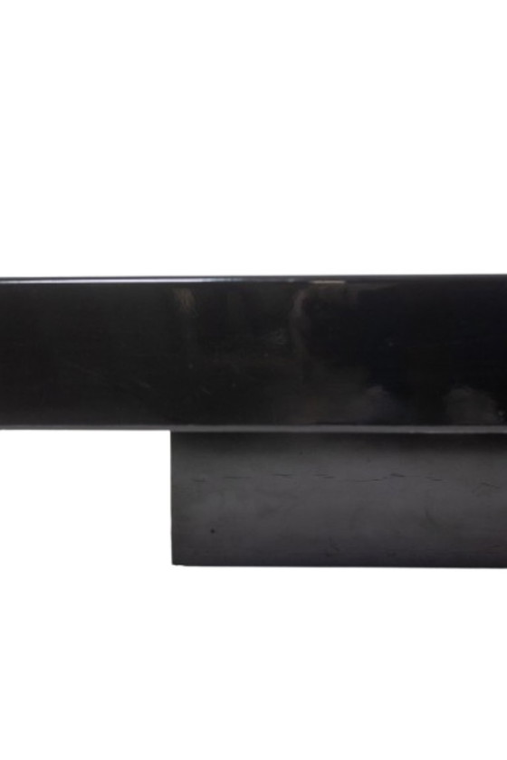 Image 1 of Willy Rizzo. Mesa de centro de madera lacada en negro y latón dorado. Años 70.