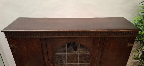 Antique oak sideboard with a central glass door and striking ball feet – Wood (photo 15 of 15)