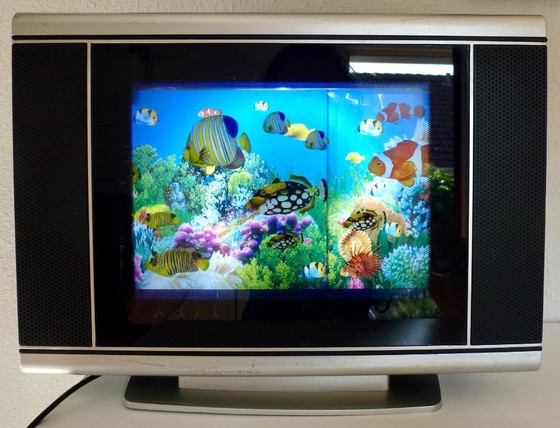 Image 1 of Vintage verlicht tropisch aquarium nagebootst, jaren 70.