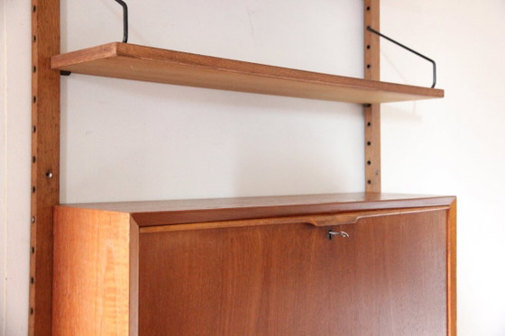 Sistema a parete Cadovius con scrivania segretario – Librerie, Legno (photo 4 of 11)