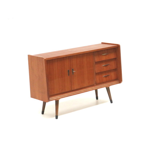 Vintage dresser with drawers and doors made in the 1950s