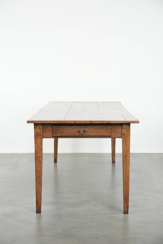 Image 1 of Antique French oak farmhouse dining table for 6 to 8 people with three drawers