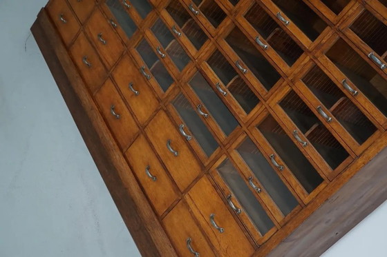 Image 1 of Großer, antiker deutscher Kurzwarenladenschrank aus Eiche, 1940er Jahre