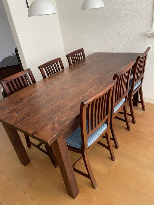 Wooden dining table with 6 chairs