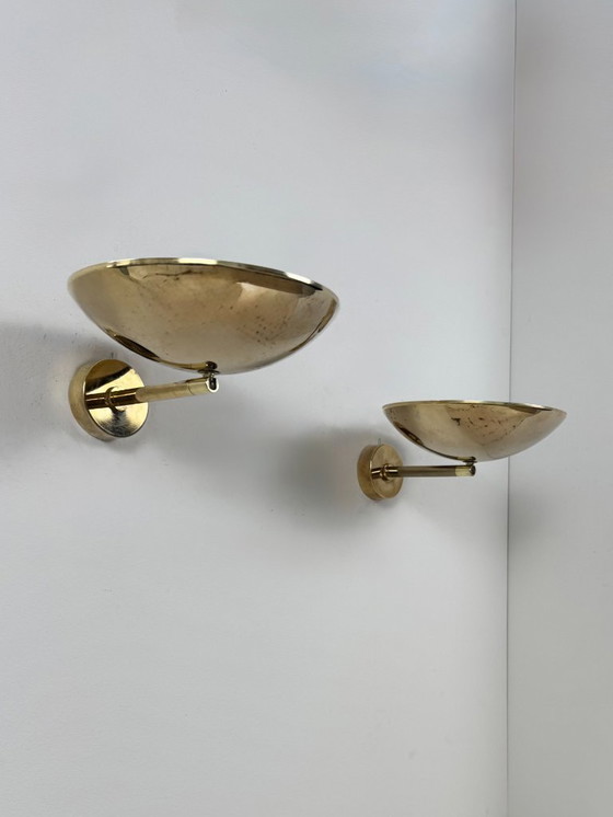 Image 1 of Een paar vintage verstelbare wandlampen, gepatineerd messing, Frankrijk, 1970