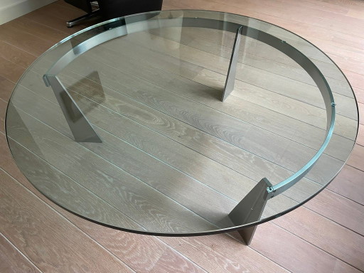 Mesa de centro redonda con tapa de cristal y base de metal