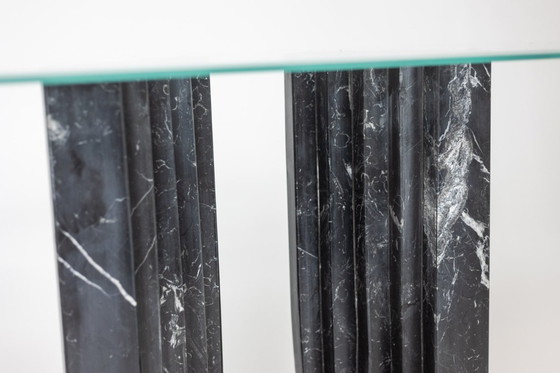 Image 1 of Pair of marble and glass top console tables. 1980s.