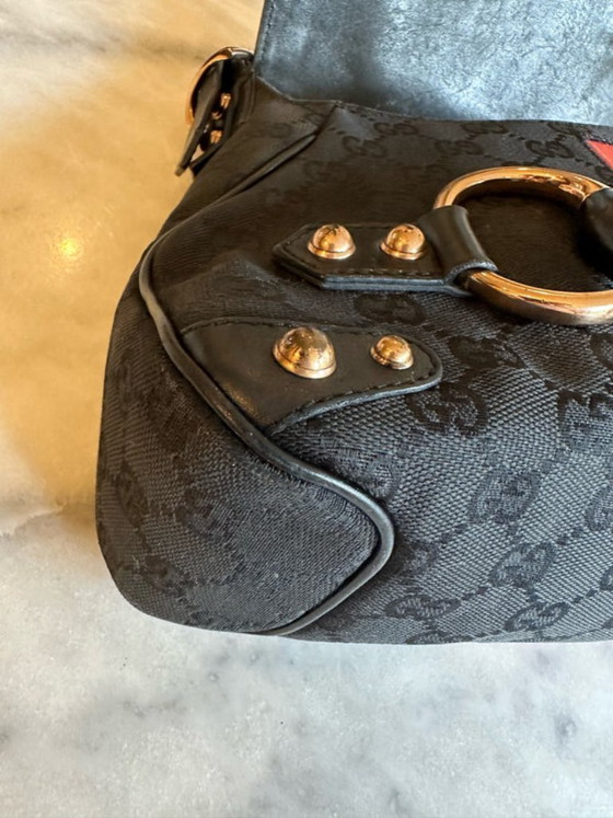 Image 1 of borsa con morsetto per cavalli