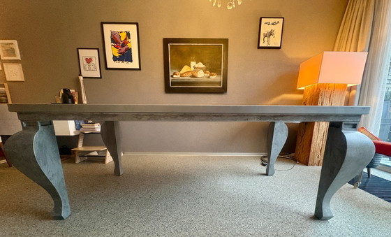 Image 1 of Zinc dining table with or without 8 leather chairs (Henders & Hazel) on wheels