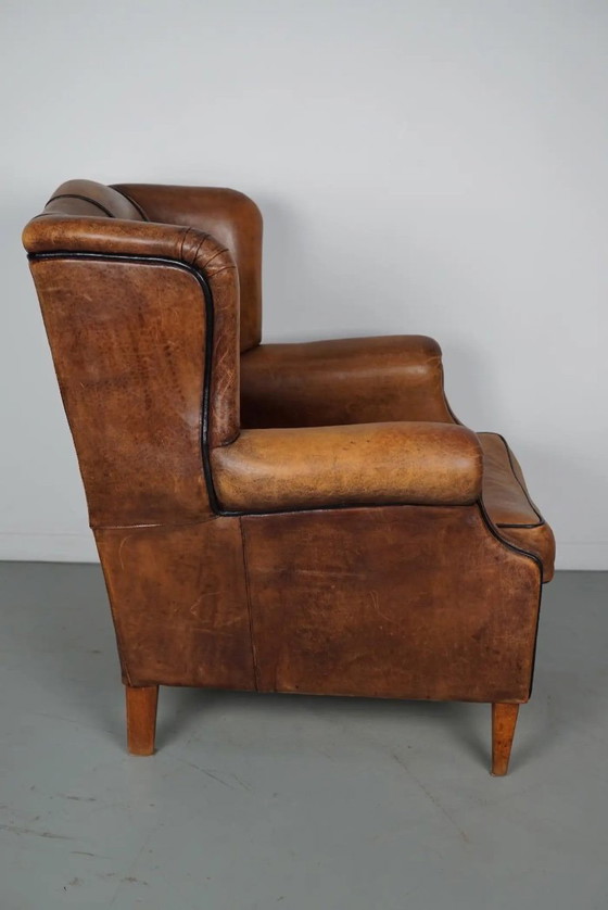 Image 1 of Vintage Nederlandse cognackleurige leren clubfauteuil