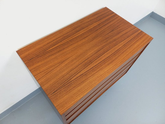 Image 1 of Vintage Scandinavian modernist style chest of drawers in rosewood and black metal from the 1960s