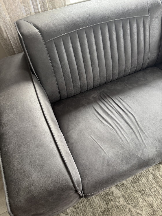 Image 1 of 3 sits bank Sowerby