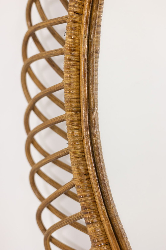 Image 1 of Pair of Round Wicker Mirrors with Interlacing. Circa 1980.