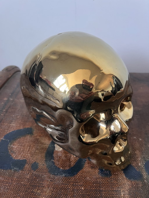 Golden skull piggy bank real life size