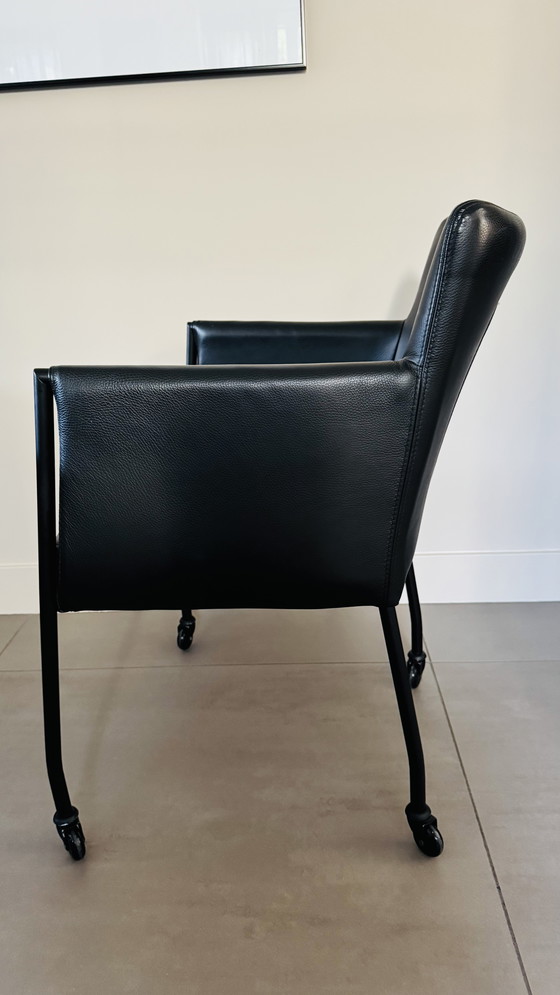 Image 1 of 8 Piet Klerkx eetkamerstoelen met armleuning, leer