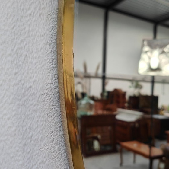 Image 1 of Vintage Goudkleurige Ovale spiegel kuifspiegel schouwspiegel. Koper 