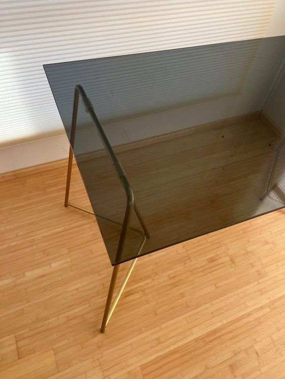 Image 1 of MADE  black smokey glass desk with golden metal legs
