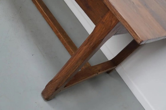 Image 1 of Early 20th-century French rustic country dining table made of oak and elm
