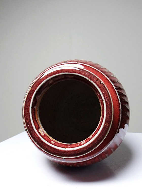 Image 1 of Oxblood-blood glazed stoneware vase with ribs, 20th-century workshop piece