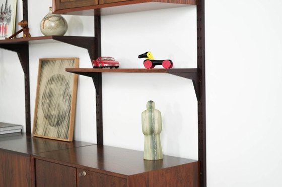 Modulaire stellingen van palissanderfineer van Poul Cadovius, Denemarken, jaren 70. – Wandkast, Mdf (photo 9 of 27)