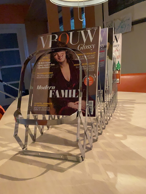 Chrome accordion magazine rack Luther Evans