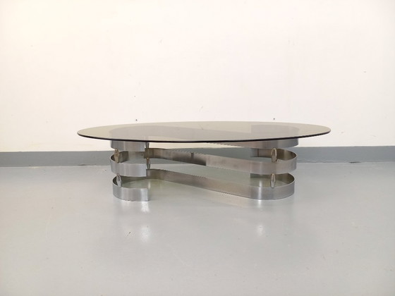 Image 1 of Vintage ovale salontafel van rookglas en verchroomd metaal uit de jaren 70.