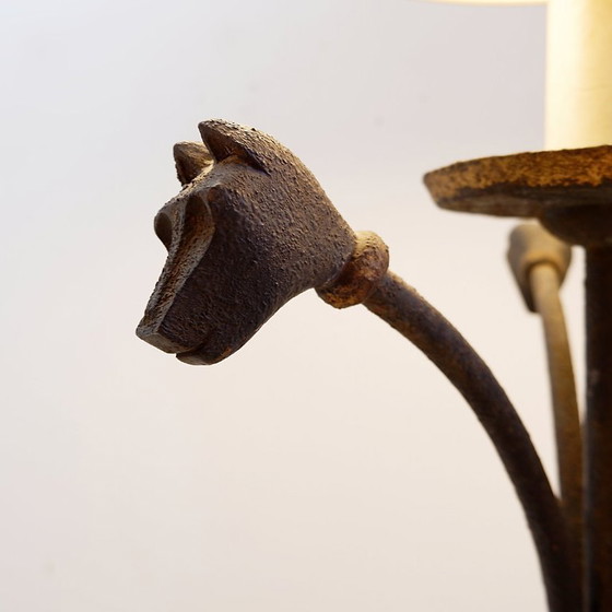 Image 1 of Wrought-iron tripod floor lamp adorned with stylized animal heads