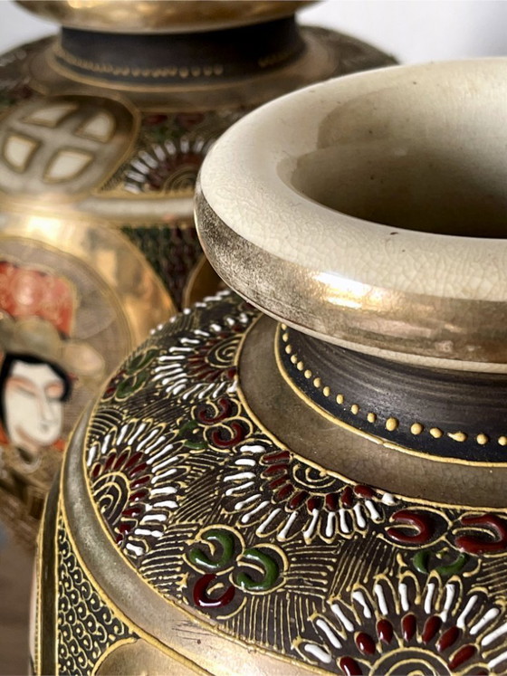 Image 1 of Pair of early 20th-century Satsuma Japanese vases – polychrome and gilt decoration with figures – workshop signature – 31 cm