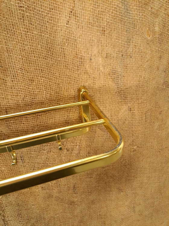 Image 1 of Porte-manteau en forme de train, couleur or, avec crochets, n° 18