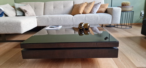 Veneer coffee table with dark glass top
