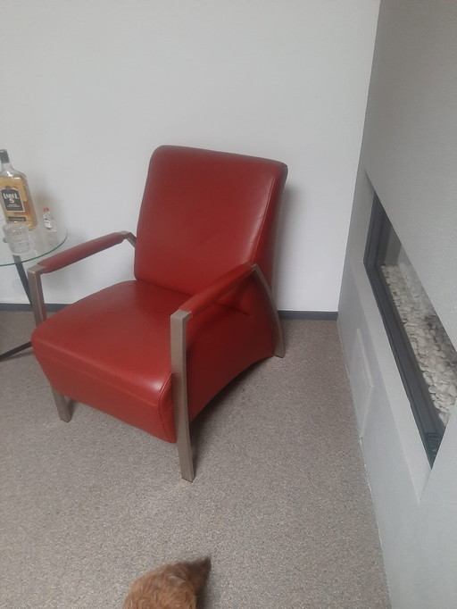 Te koop twee mooie soepel leren stoelen met RVS