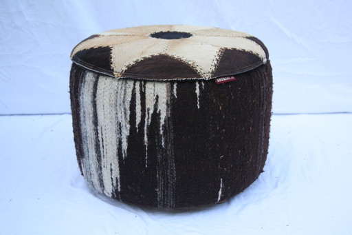 Two vintage (sheep's wool) poufs with storage space