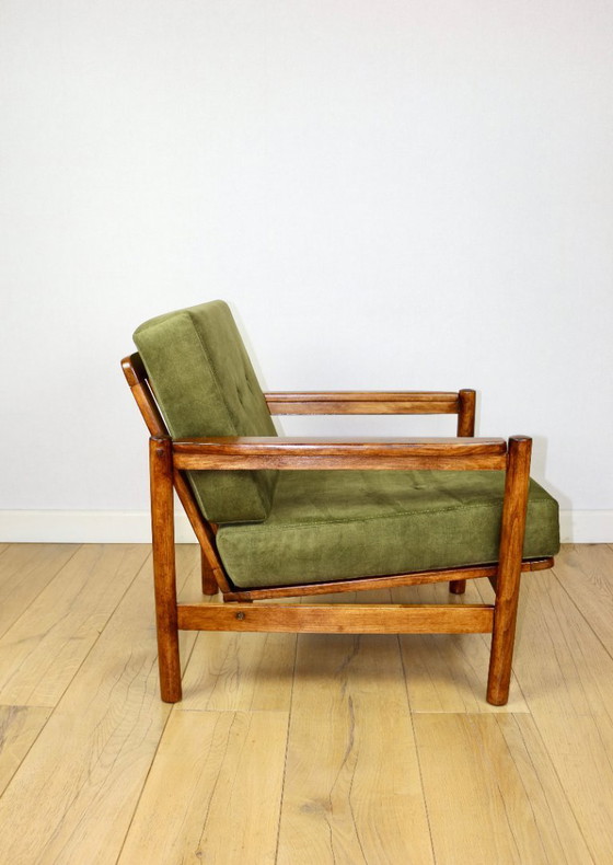 Image 1 of Wooden armchair designed by Z. Baczyk in a vintage style, upholstered in olive green velvet.