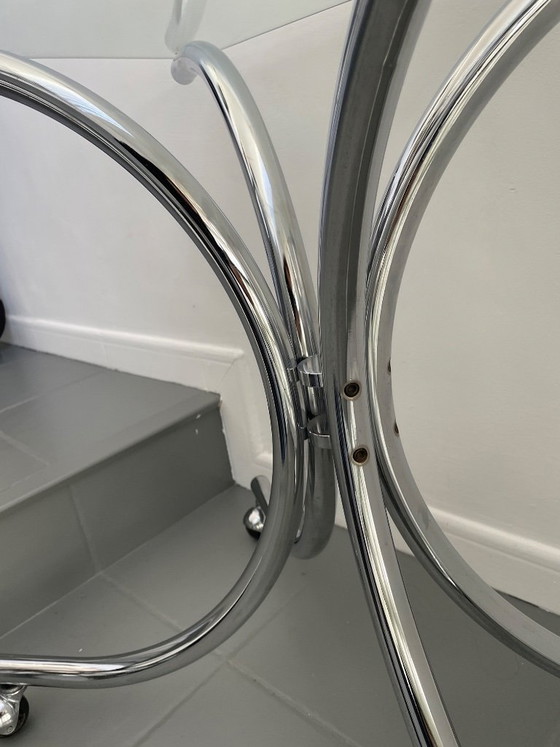 Image 1 of Salontafel van chroom en glas met wielen