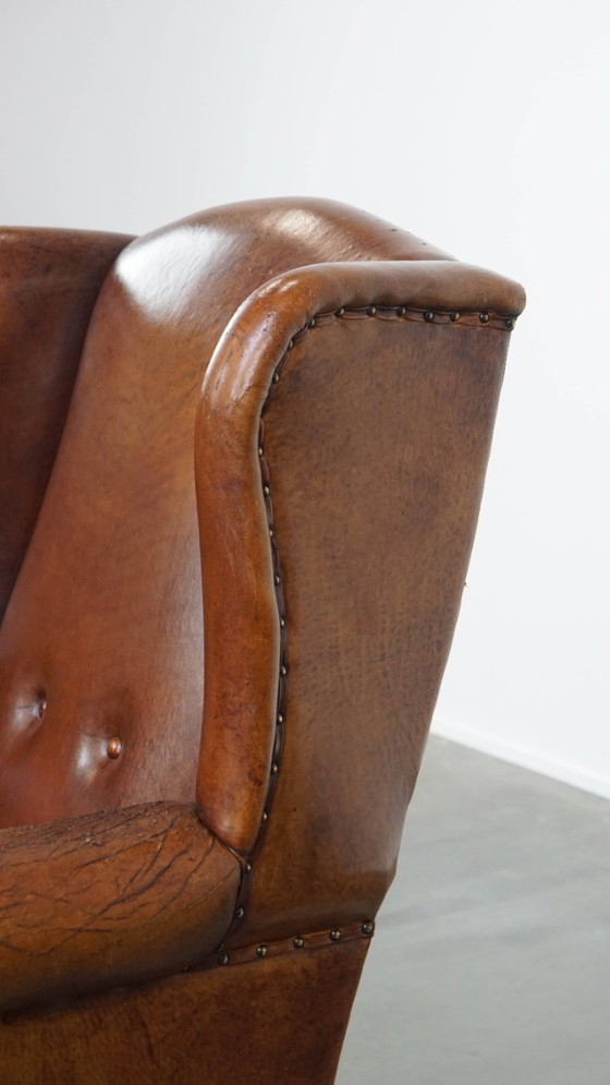 Image 1 of Grote vintage schapenleren oorfauteuil