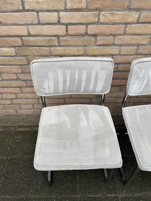 4 sedie a slitta in velluto a coste con struttura tubolare cromata