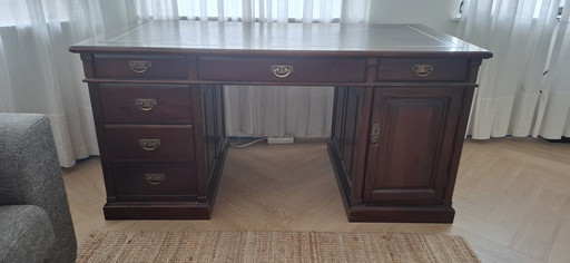 Solid wood desk with brass fittings