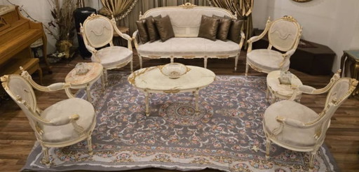 Salonsuite in verguld hout in Lodewijk XVI-stijl: bank, 4 fauteuils en 3 onyxtafels