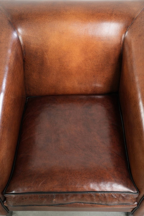 Image 1 of Sheepskin Art Deco design armchair with black piping