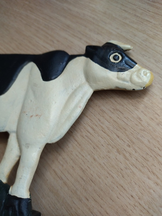 Image 1 of Paire d’équerres vintage en fonte à motif vaches – 