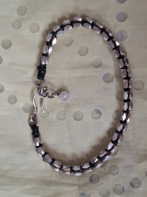 Verstelbare, flexibele armband van sterling zilver, geschikt voor polsen met een omtrek van 21,5 tot 23 cm.